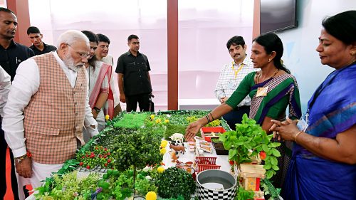 Prime Minister Narendra Modi during a state-level Mahila Saksham Melava or Empowered Women Meet of Self Help Groups