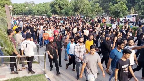 Students gather inside the Chandigarh University campus demanding justice over the alleged 'leaked objectional videos' row